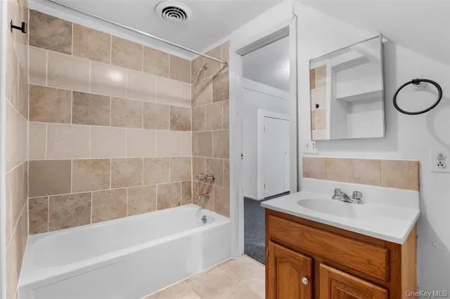 a view of a house with a street