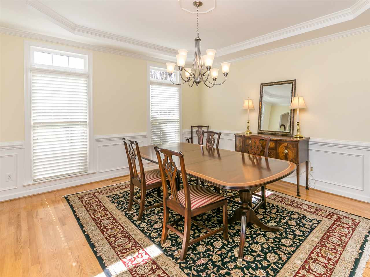 2401 Narrawood Street Raleigh, NC 27614 - Photo 12 of 25 Carpet in Dining Room, Living Room and Family Room Replaced with Beautiful Hardwoods Dining Room