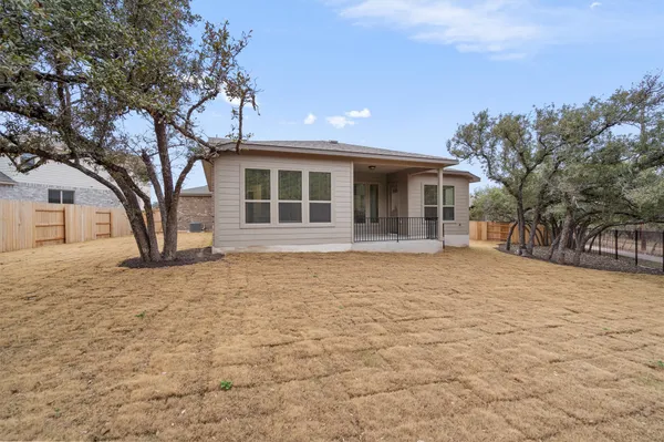 a house with trees in front of it