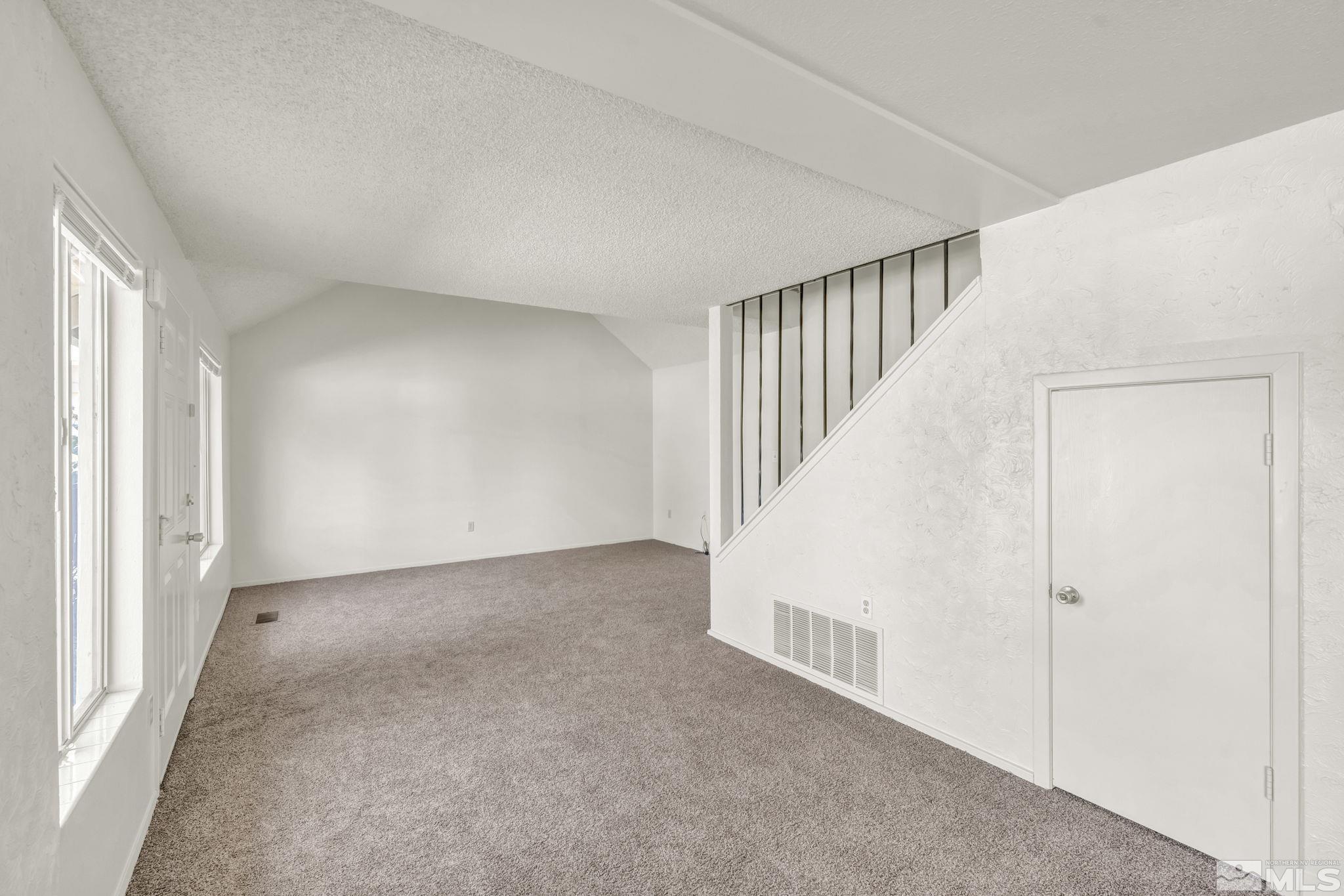 13 Condor Circle Carson City, NV 89701 - Photo 11 of 33 a view of an empty room with stairs