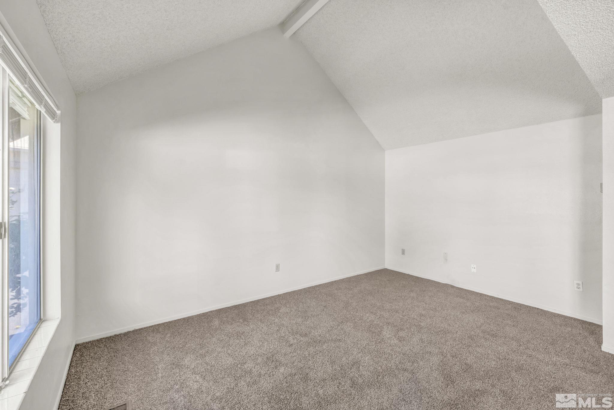 13 Condor Circle Carson City, NV 89701 - Photo 12 of 33 an empty room with a window