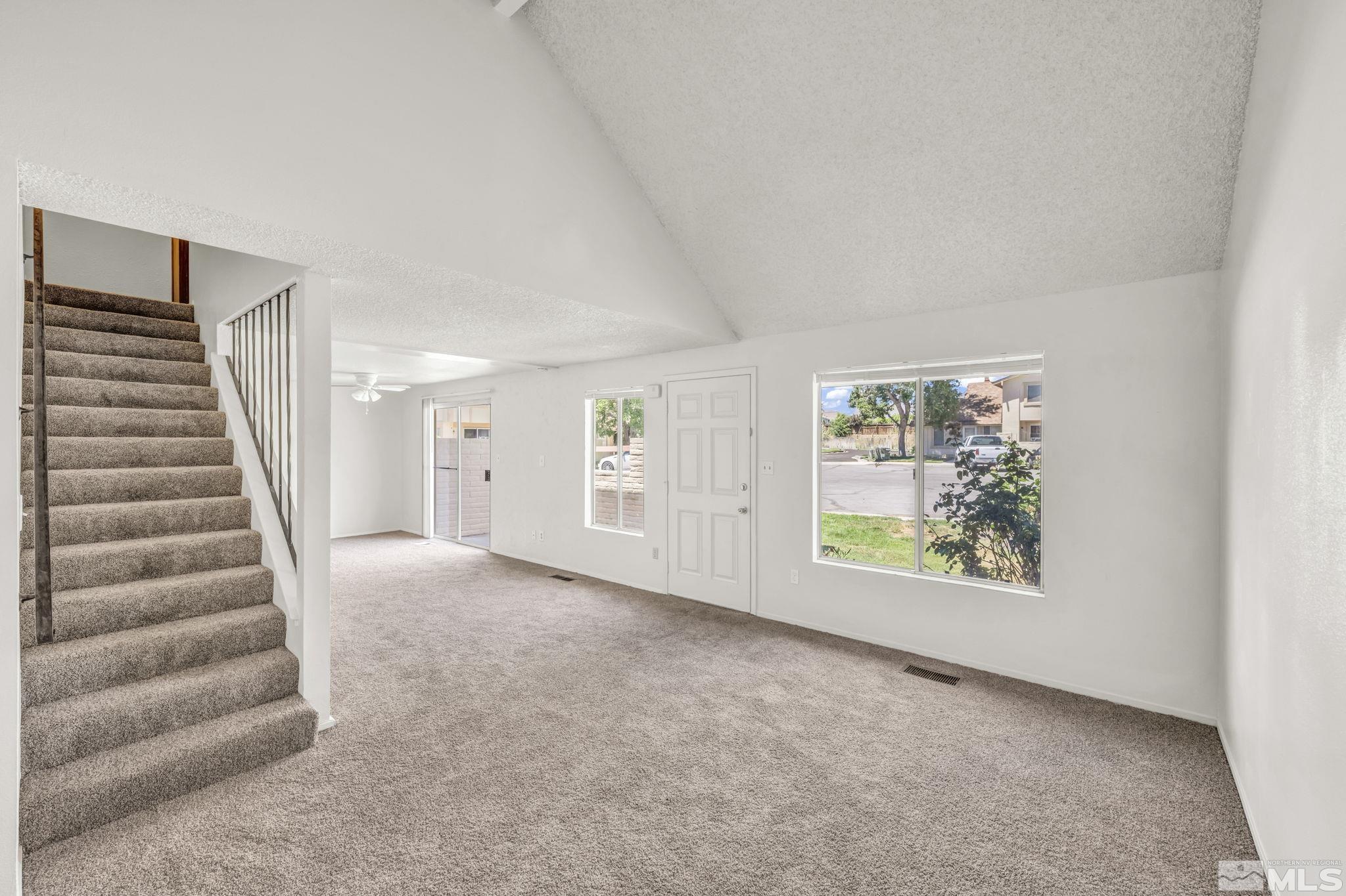 13 Condor Circle Carson City, NV 89701 - Photo 13 of 33 an empty room with windows