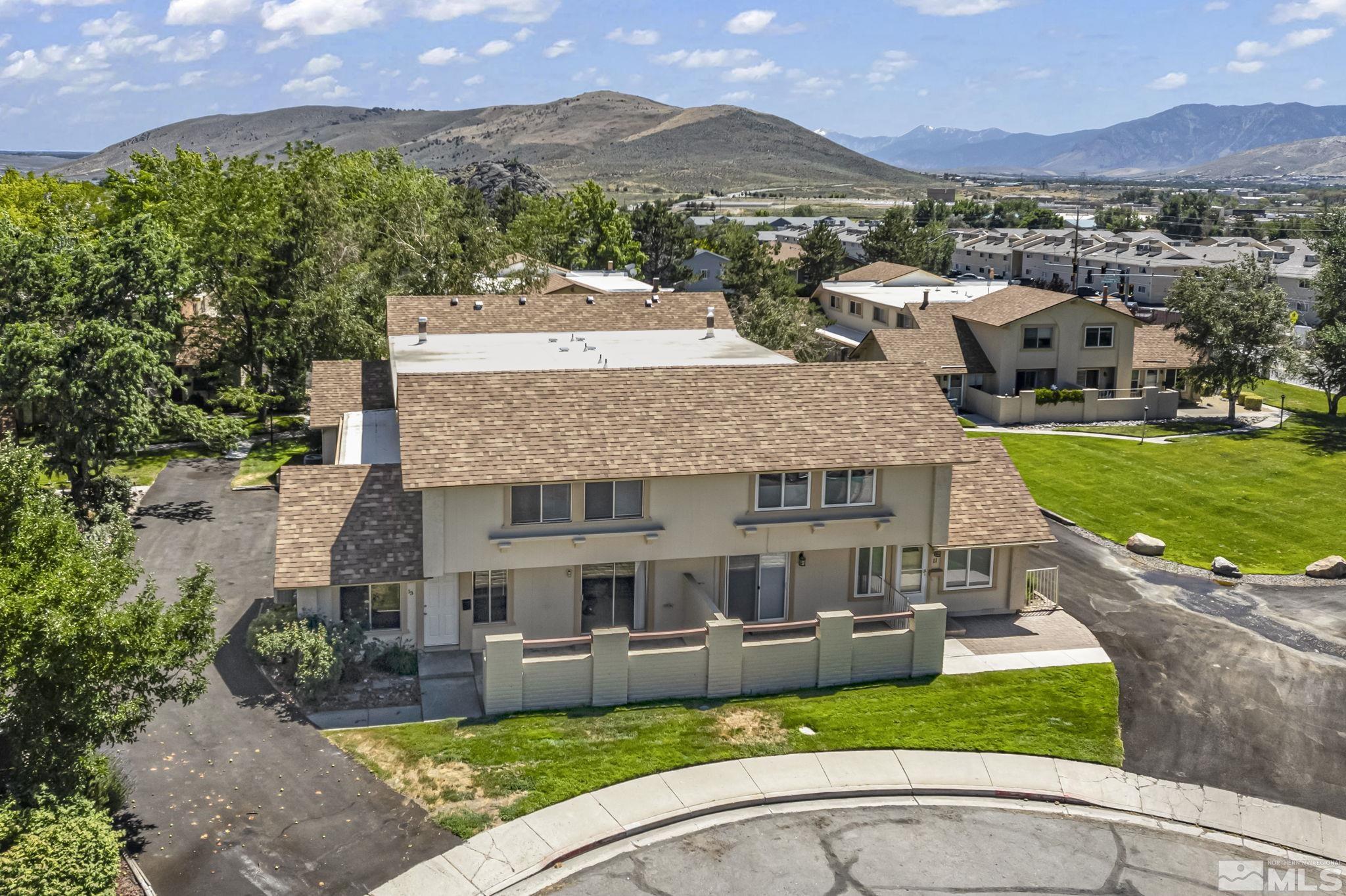 13 Condor Circle Carson City, NV 89701 - Photo 27 of 33 a front view of house with yard and mountain view in back