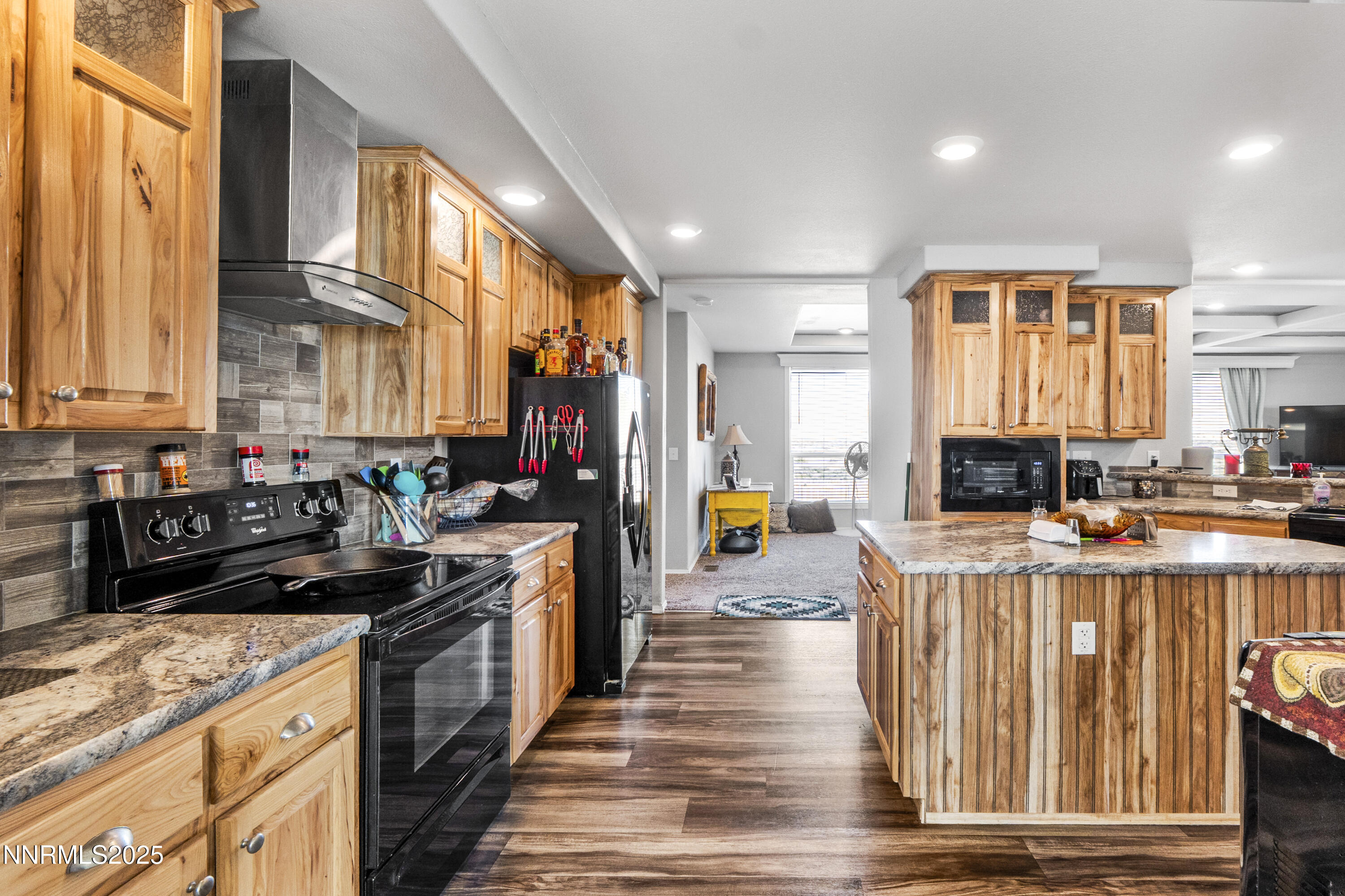 6745 Country Road Winnemucca, NV 89445 - Photo 12 of 50 a kitchen with lots of counter top space and stainless steel appliances