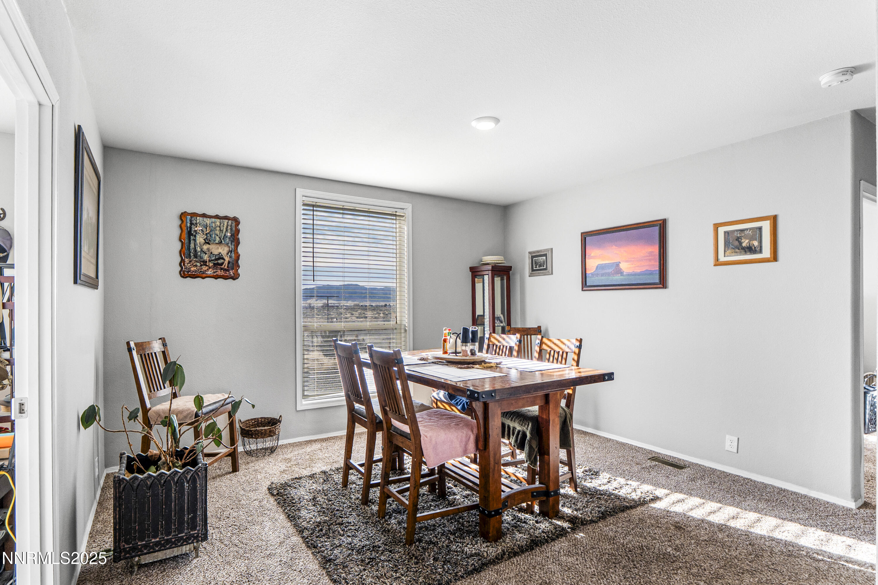 6745 Country Road Winnemucca, NV 89445 - Photo 13 of 50 a view of a dining room with furniture