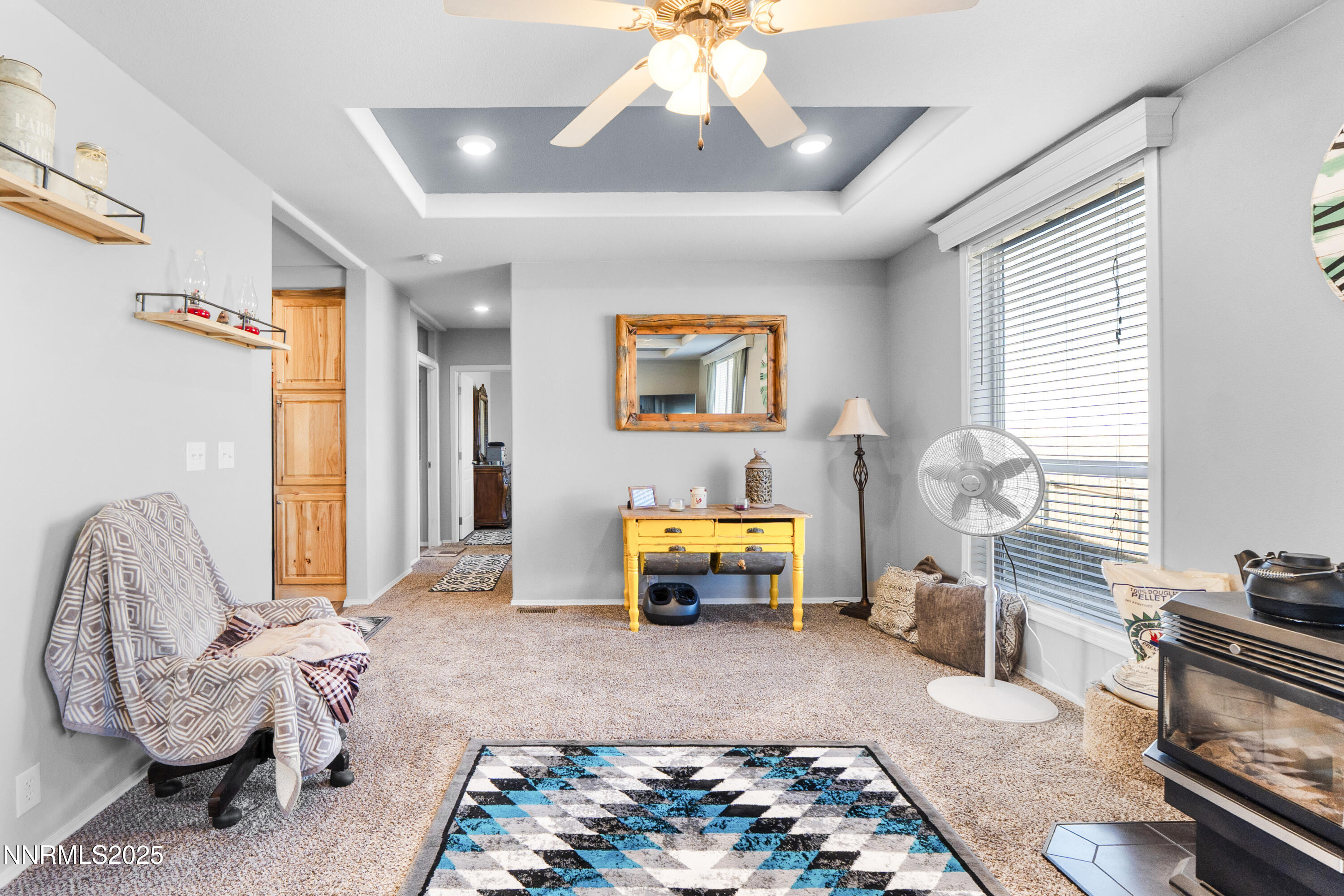 6745 Country Road Winnemucca, NV 89445 - Photo 28 of 50 a bedroom with a bed and a couch