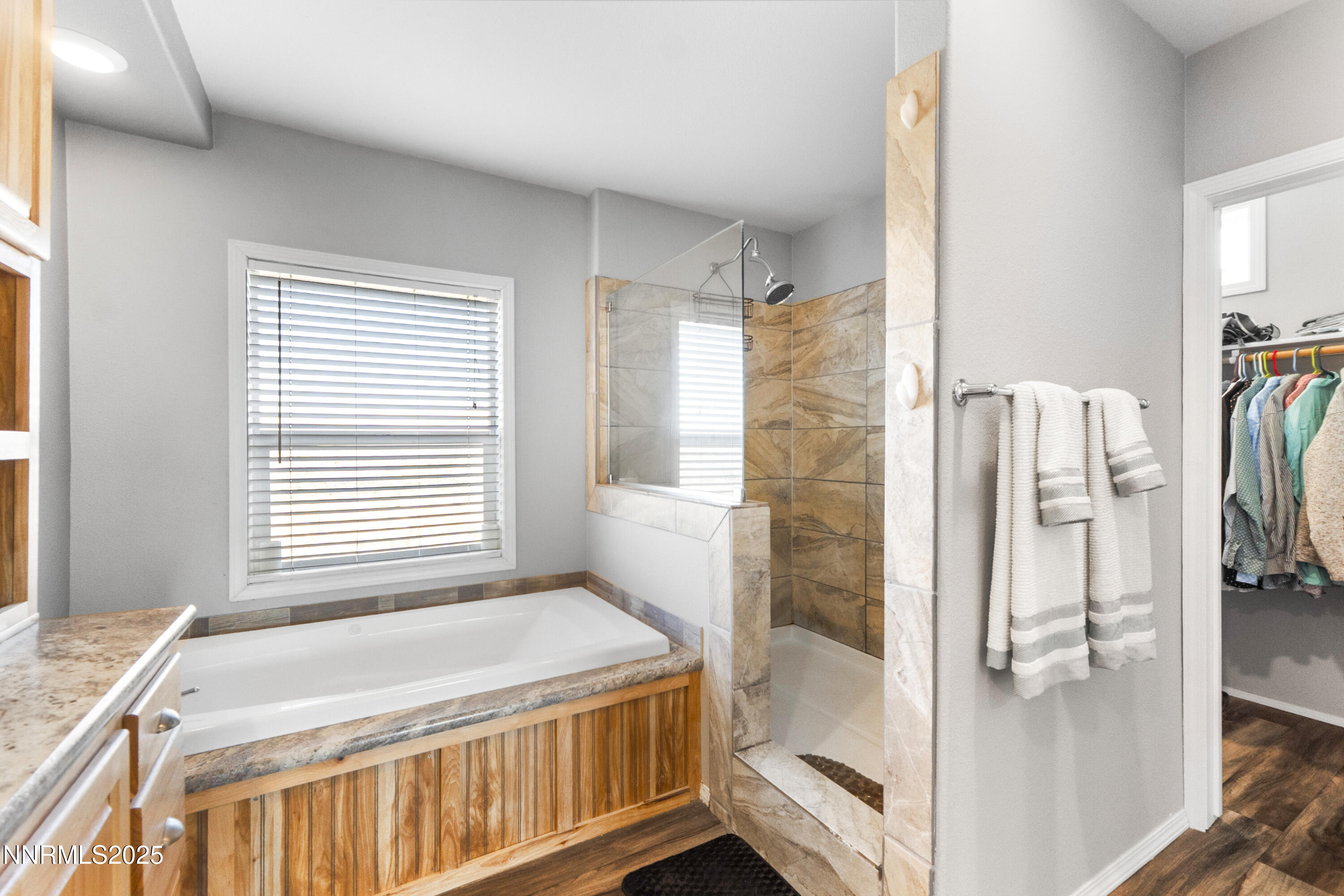 6745 Country Road Winnemucca, NV 89445 - Photo 35 of 50 a bathroom with a granite countertop shower and a sink