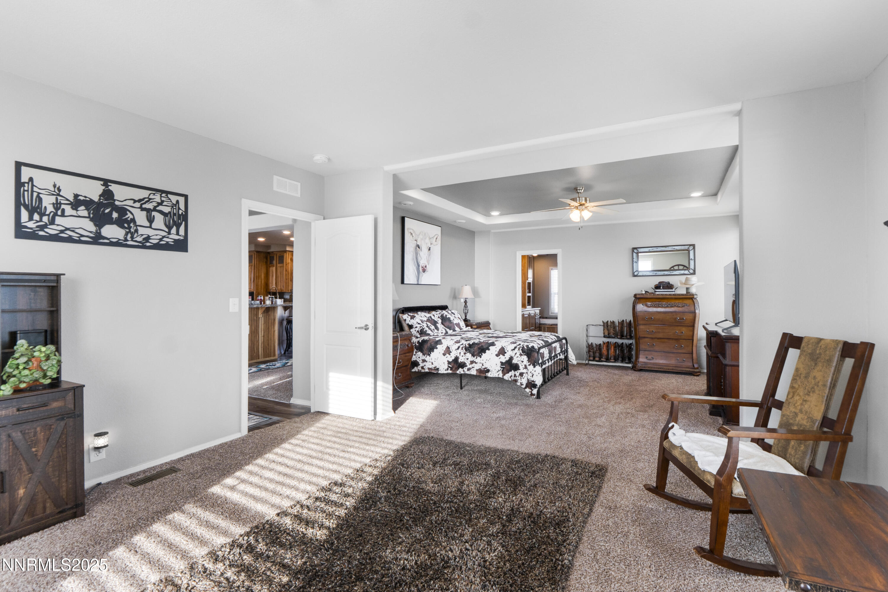 6745 Country Road Winnemucca, NV 89445 - Photo 38 of 50 a bedroom with furniture and wooden floor