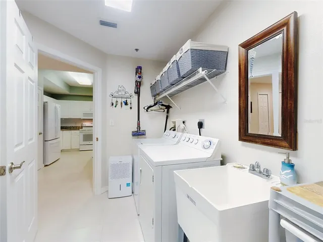 a view of a chairs and table in patio