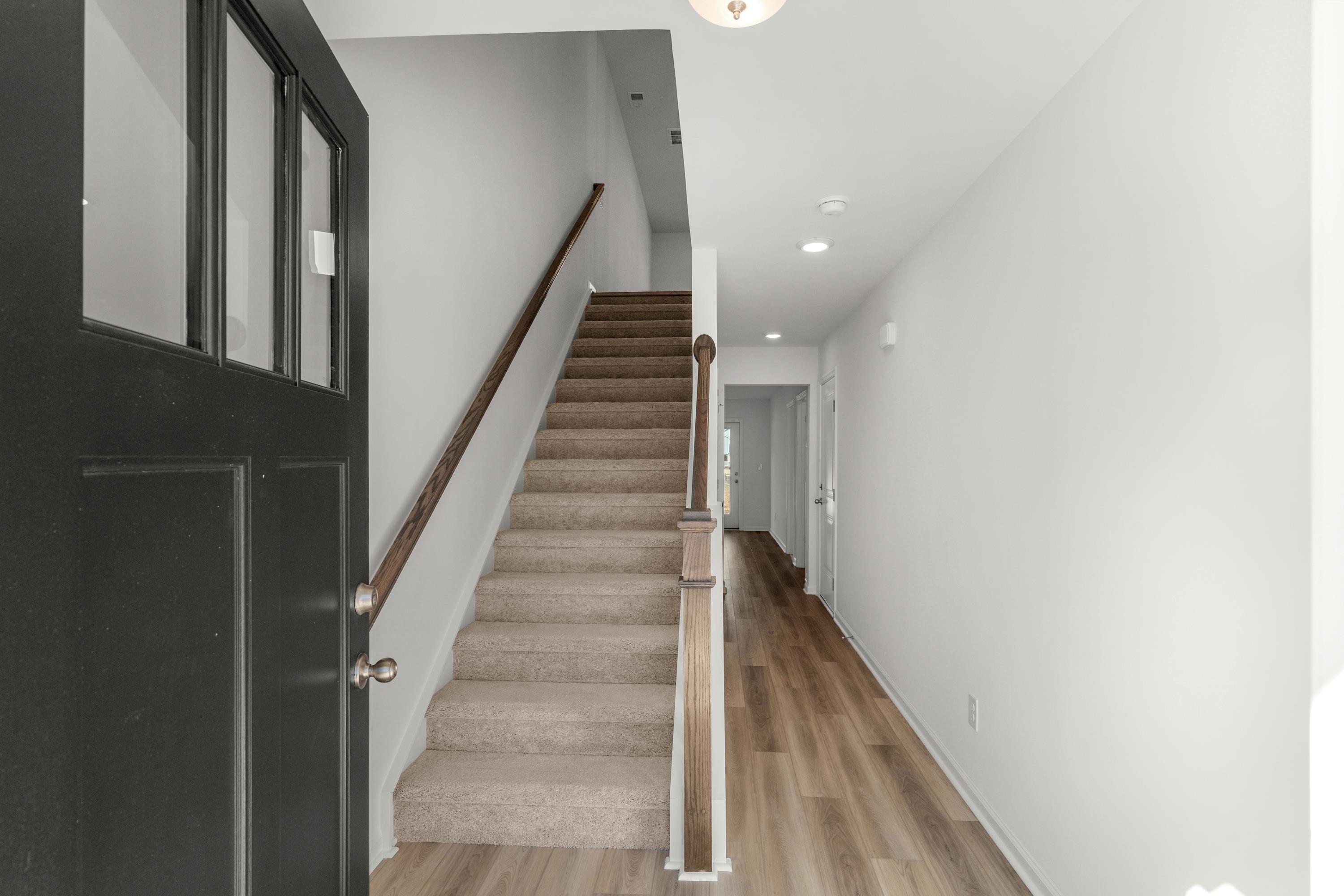 4414 Kingsport Road, Unit 1502 Little River, SC 29566 - Photo 2 of 33 Staircase featuring wood finished floors and recessed lighting