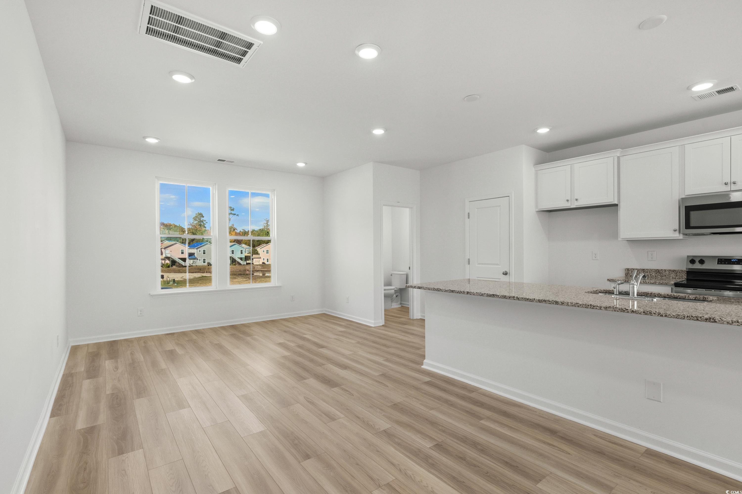 4414 Kingsport Road, Unit 1502 Little River, SC 29566 - Photo 7 of 33 Half bath main living level