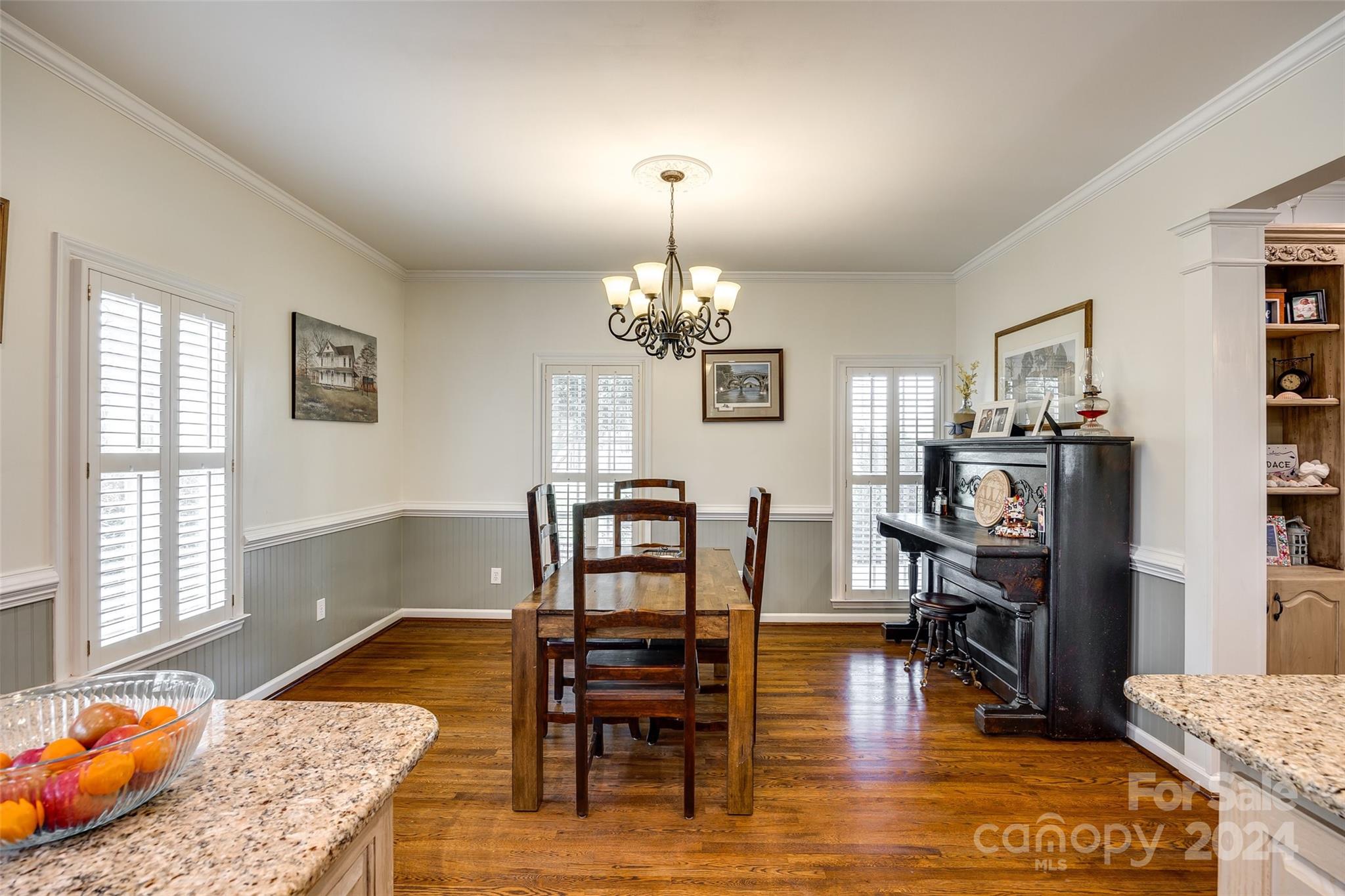 9999 Jim Sossoman Road Midland, NC 28107 - Photo 12 of 43 a living room with furniture and a wooden floor