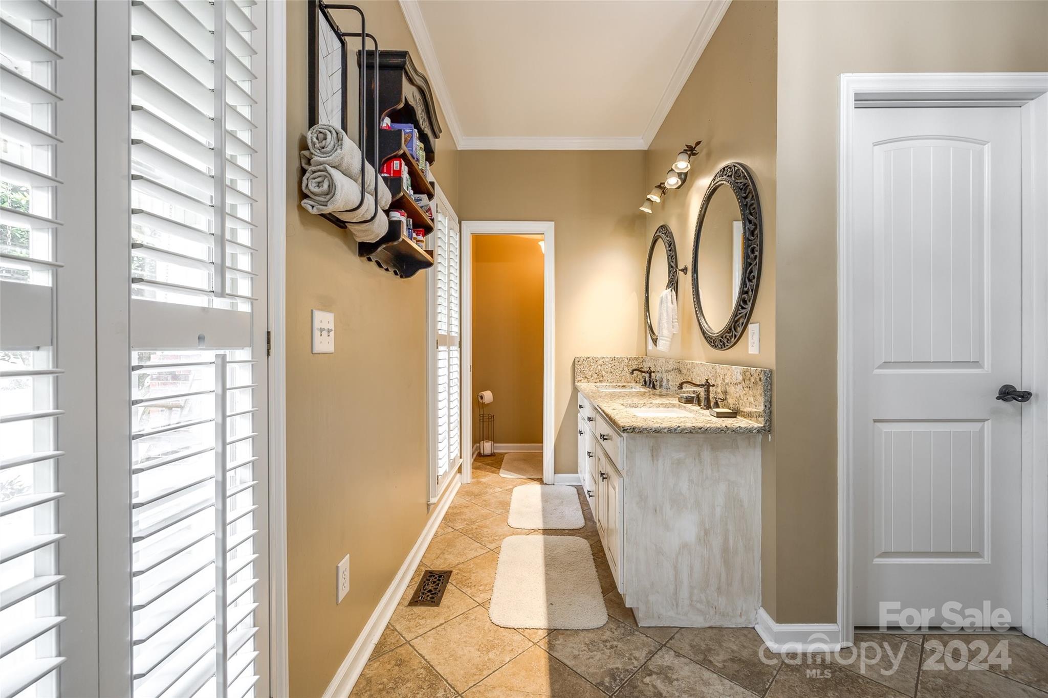 9999 Jim Sossoman Road Midland, NC 28107 - Photo 20 of 43 a bathroom with a sink and a mirror