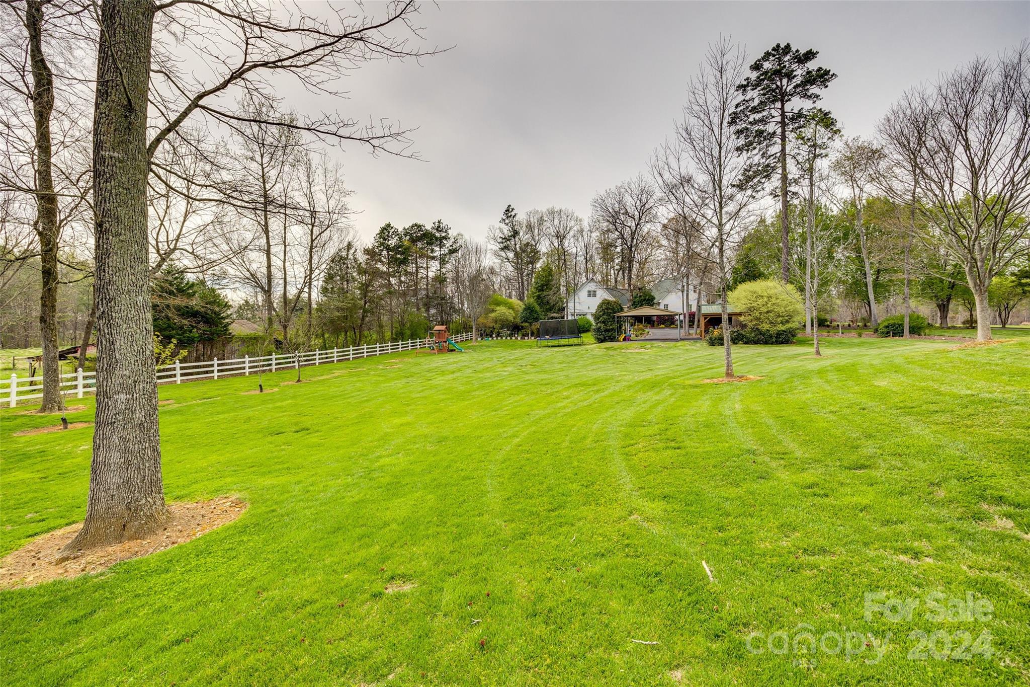 9999 Jim Sossoman Road Midland, NC 28107 - Photo 36 of 43 a view of a park with large trees