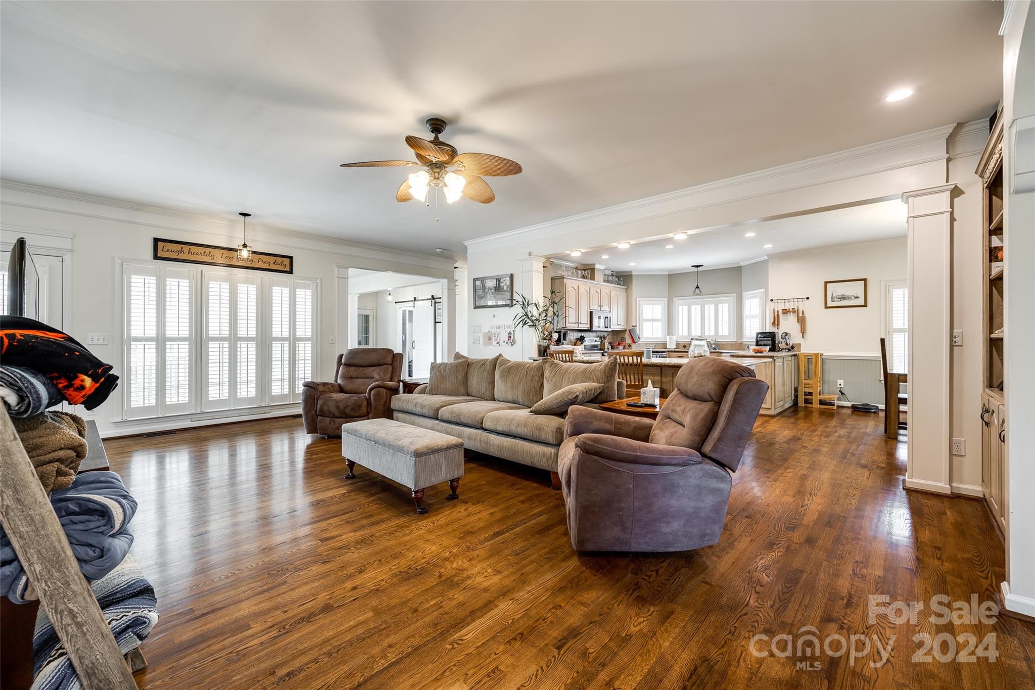 9999 Jim Sossoman Road Midland, NC 28107 - Photo 6 of 43 a living room with furniture wooden floor and a window