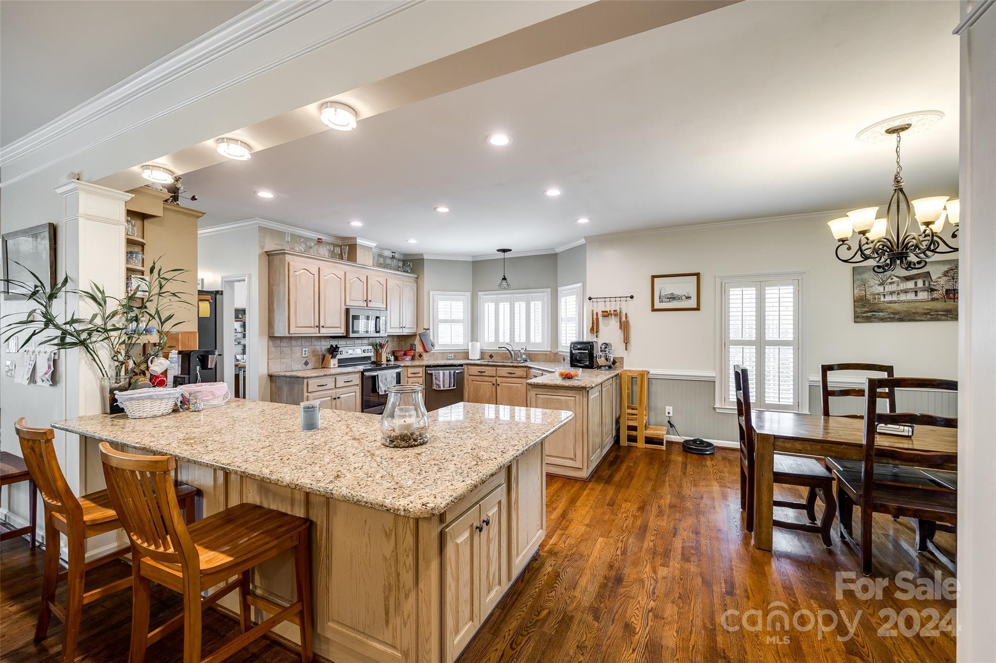 9999 Jim Sossoman Road Midland, NC 28107 - Photo 9 of 43 a view of a dining room with furniture and wooden floor