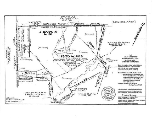 a kitchen with stainless steel appliances kitchen island granite countertop a refrigerator and a stove top oven