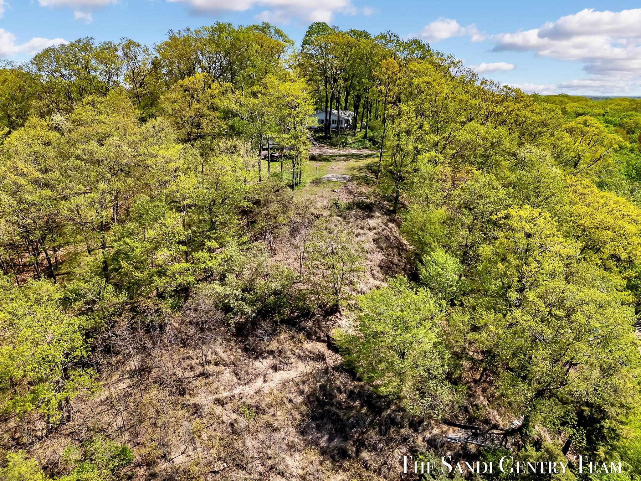 18111 Ridge Drive Grand Haven, MI 49417 - Photo 15 of 24 17-DJI_20250516120423_0395_D