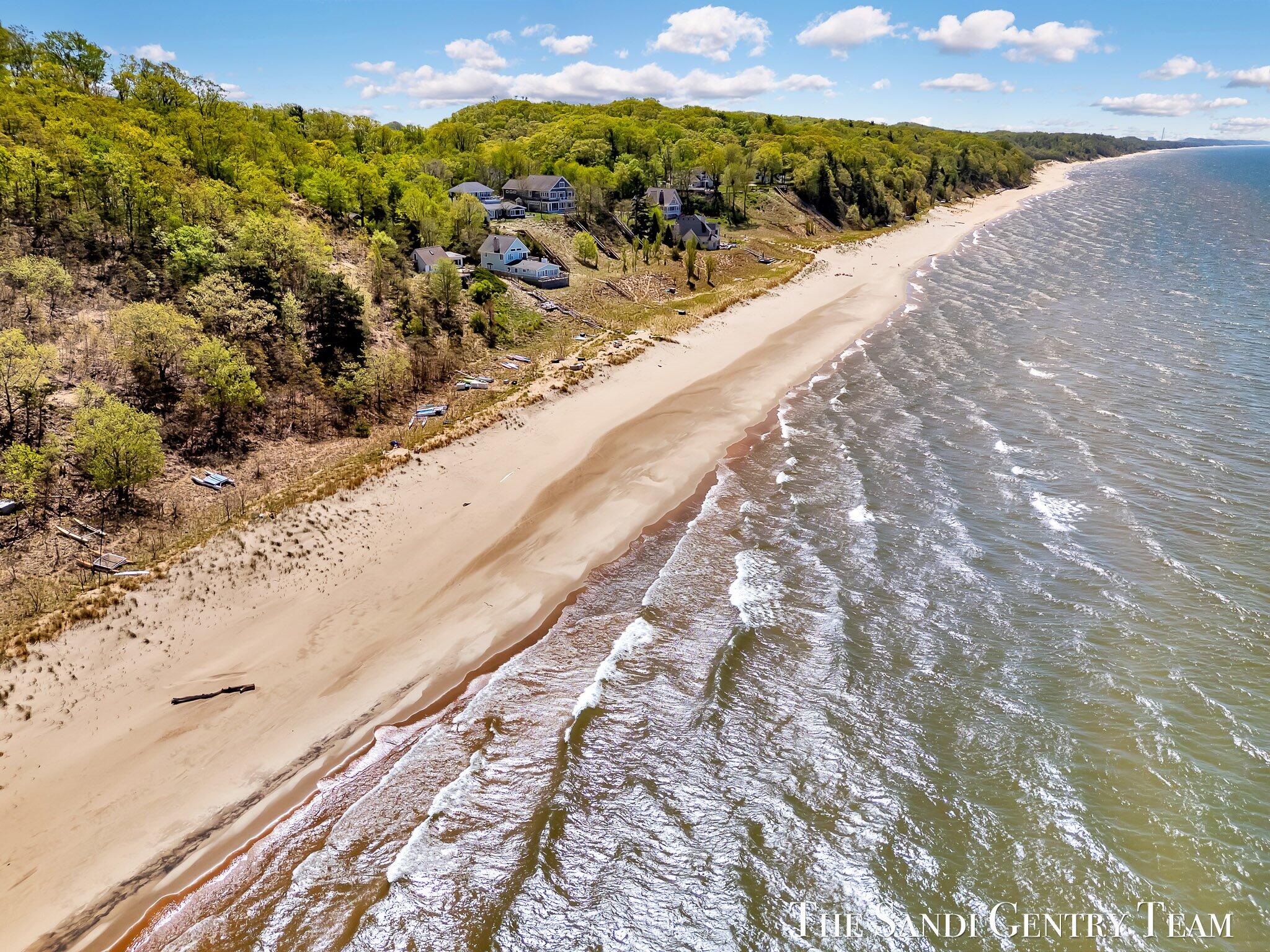 18111 Ridge Drive Grand Haven, MI 49417 - Photo 9 of 24 21-DJI_20250516120650_0425_D