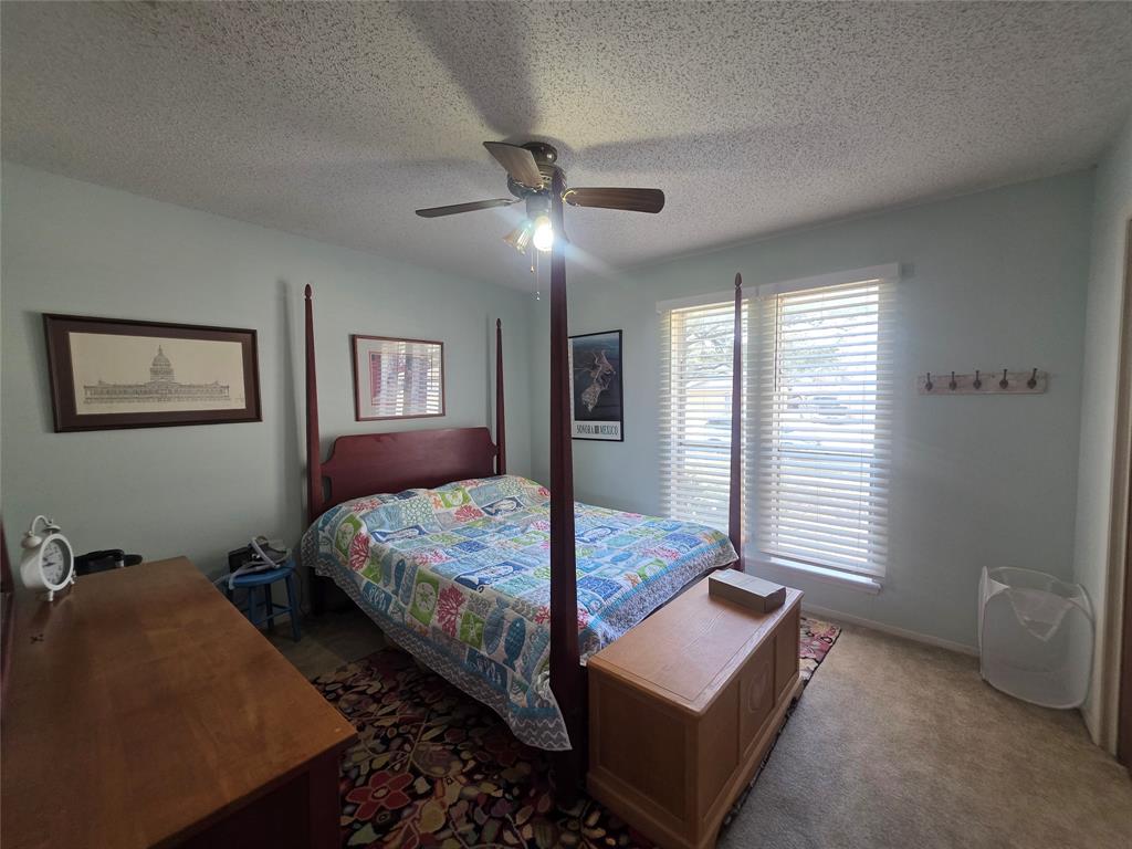 1301 Cliff Drive Graham, TX 76450 - Photo 23 of 38 a bedroom with bed and window