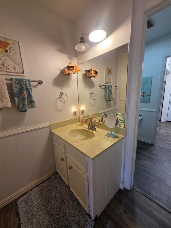 1301 Cliff Drive Graham, TX 76450 - Photo 27 of 38 a bathroom with a sink and a mirror