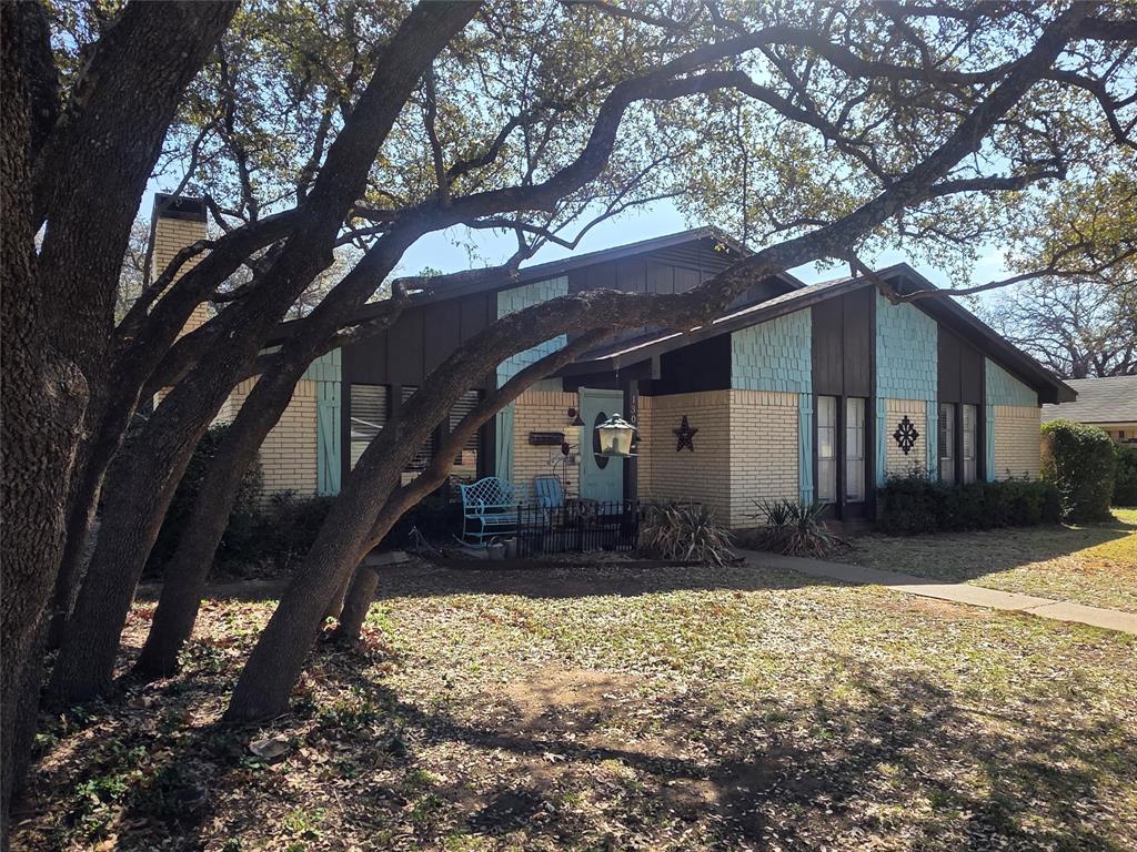 1301 Cliff Drive Graham, TX 76450 - Photo 3 of 38 a view of a house with a yard tree
