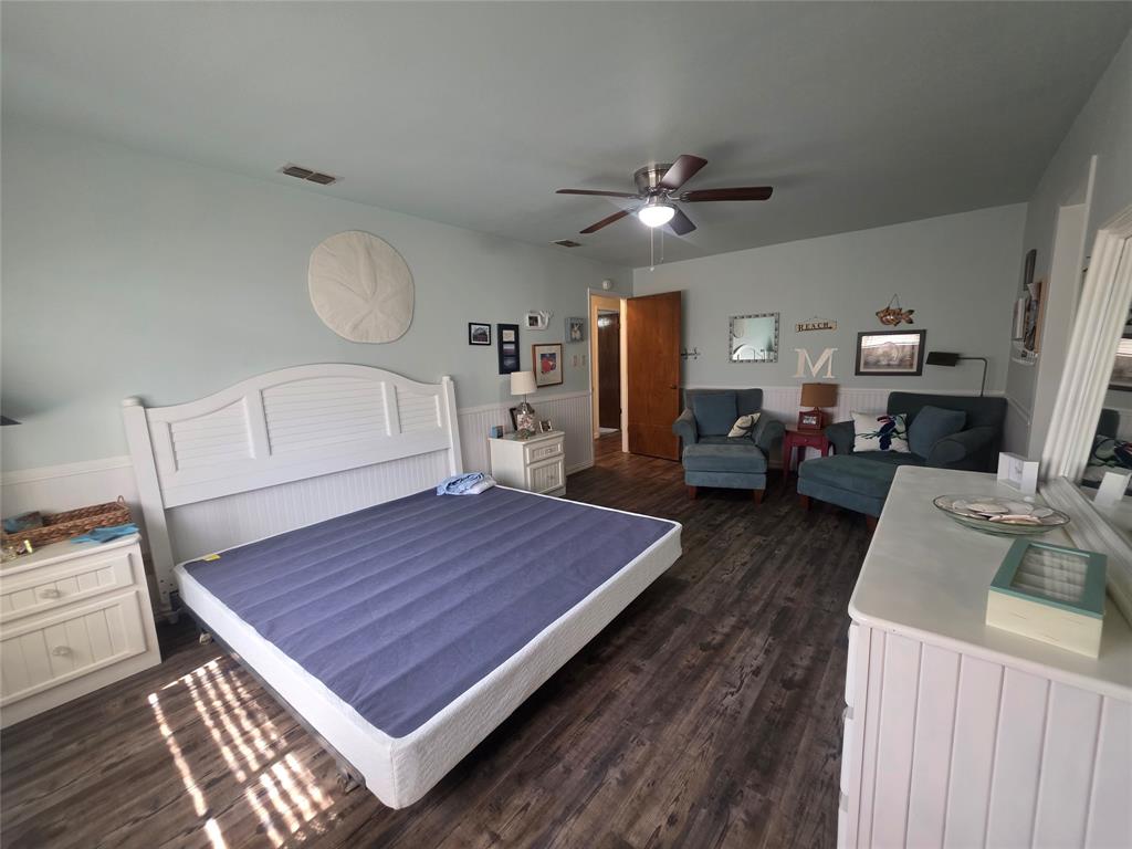 1301 Cliff Drive Graham, TX 76450 - Photo 32 of 38 a bed room with a bed and mirror