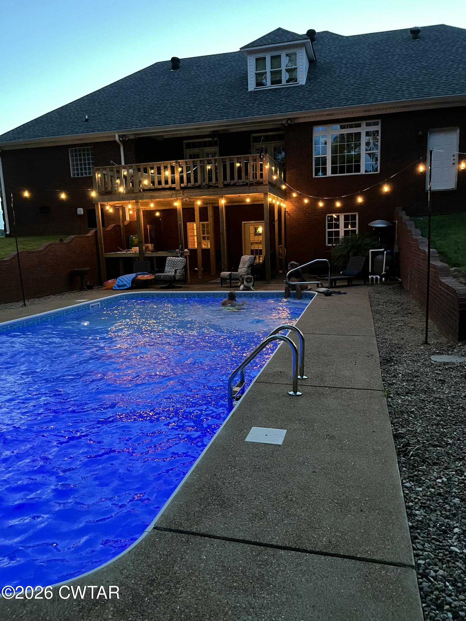 4320 Timberlake-Wildersville Road Lexington, TN 38351 - Photo 2 of 4 a swimming pool view with a outdoor seating