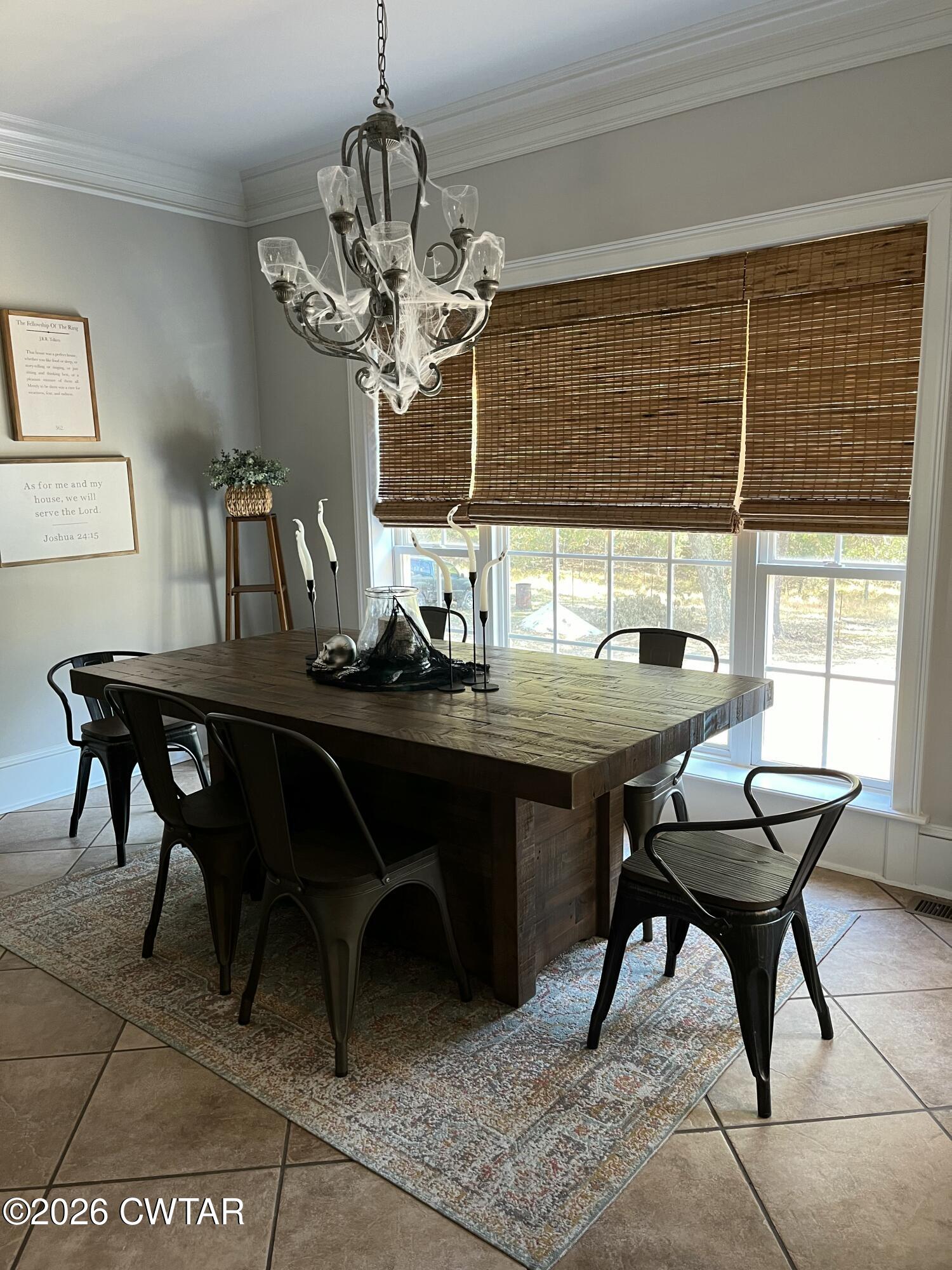 4320 Timberlake-Wildersville Road Lexington, TN 38351 - Photo 3 of 4 a view of a dining room with furniture