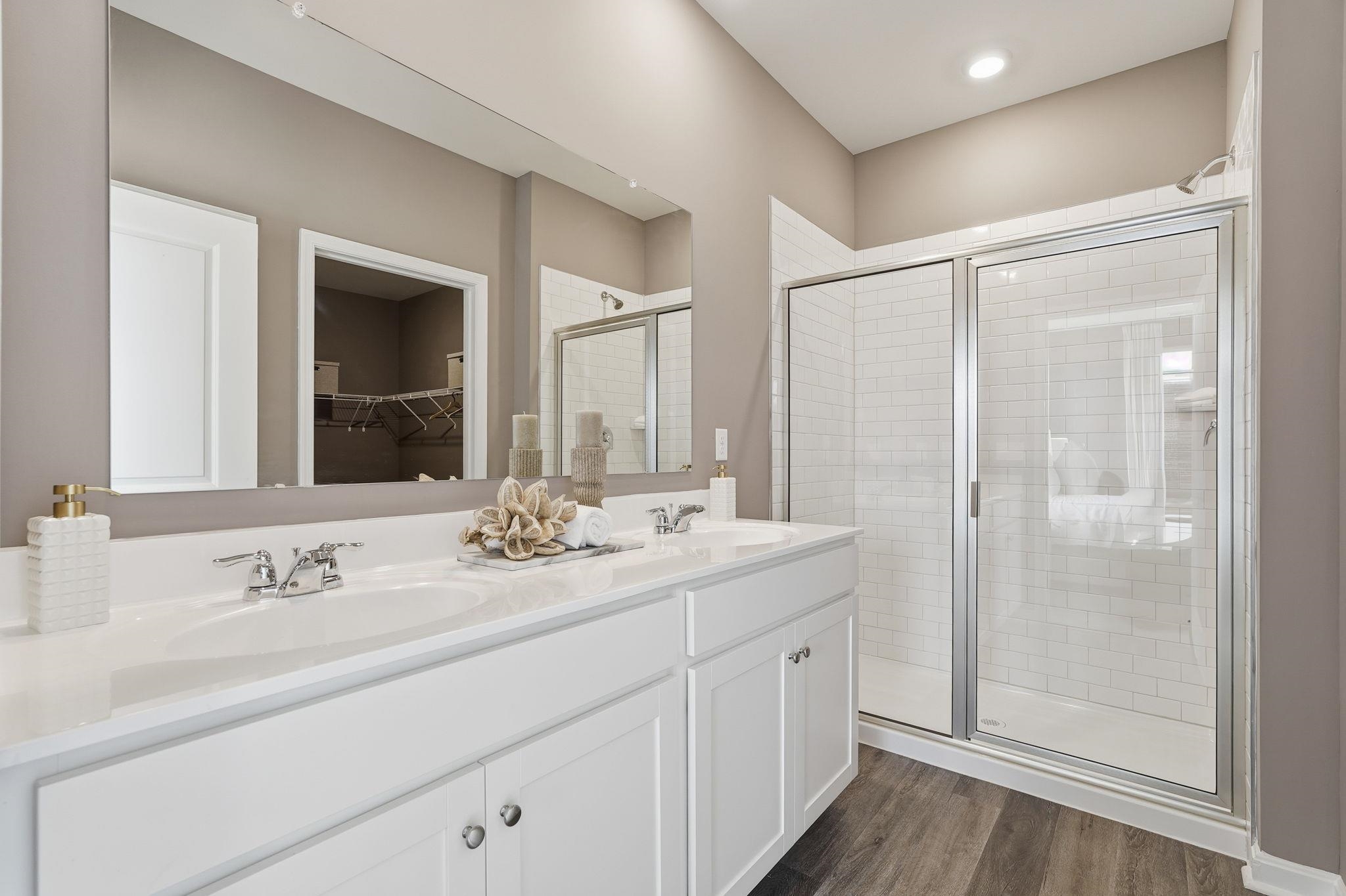105 Jillian Lane Penn Laird, VA 22846 - Photo 32 of 35 a bathroom with a double vanity sink mirror and double