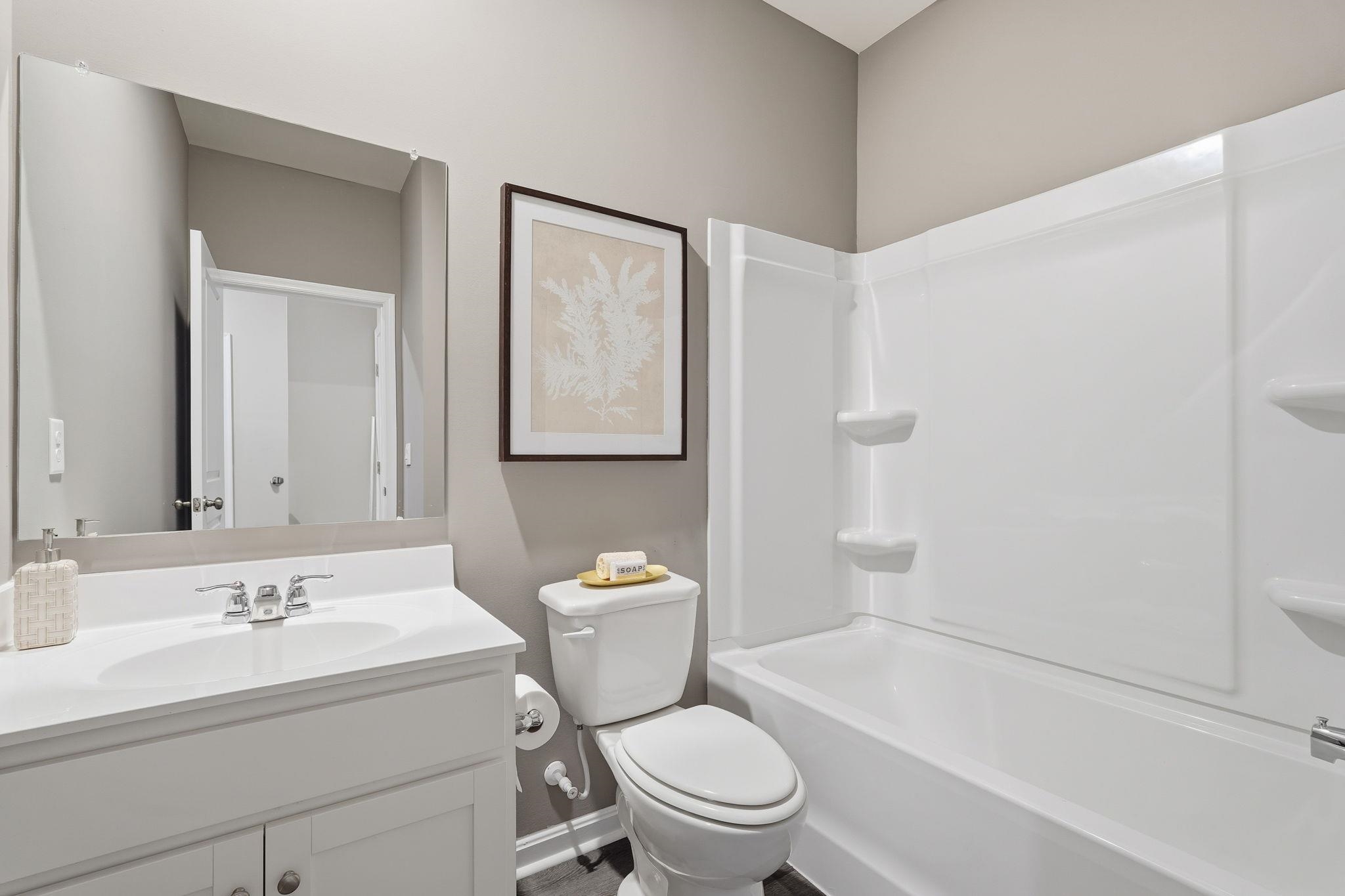 105 Jillian Lane Penn Laird, VA 22846 - Photo 34 of 35 a white toilet sitting next to a bathroom sink