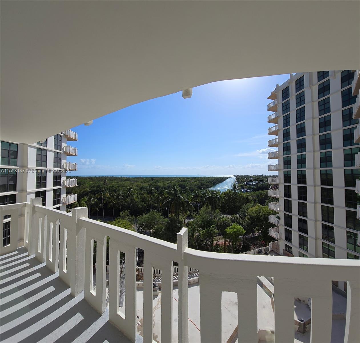 1121 Crandon Boulevard, Unit D604 Key Biscayne, FL 33149 - Photo 19 of 31 a view of a building from balcony