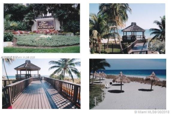 1121 Crandon Boulevard, Unit D604 Key Biscayne, FL 33149 - Photo 29 of 31 a view of a swimming pool with a balcony