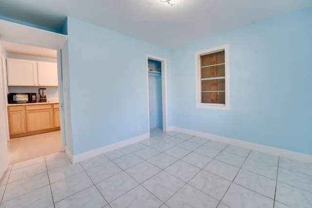 an empty room with windows