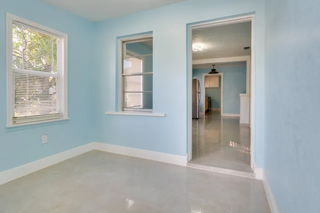 an empty room that has a window