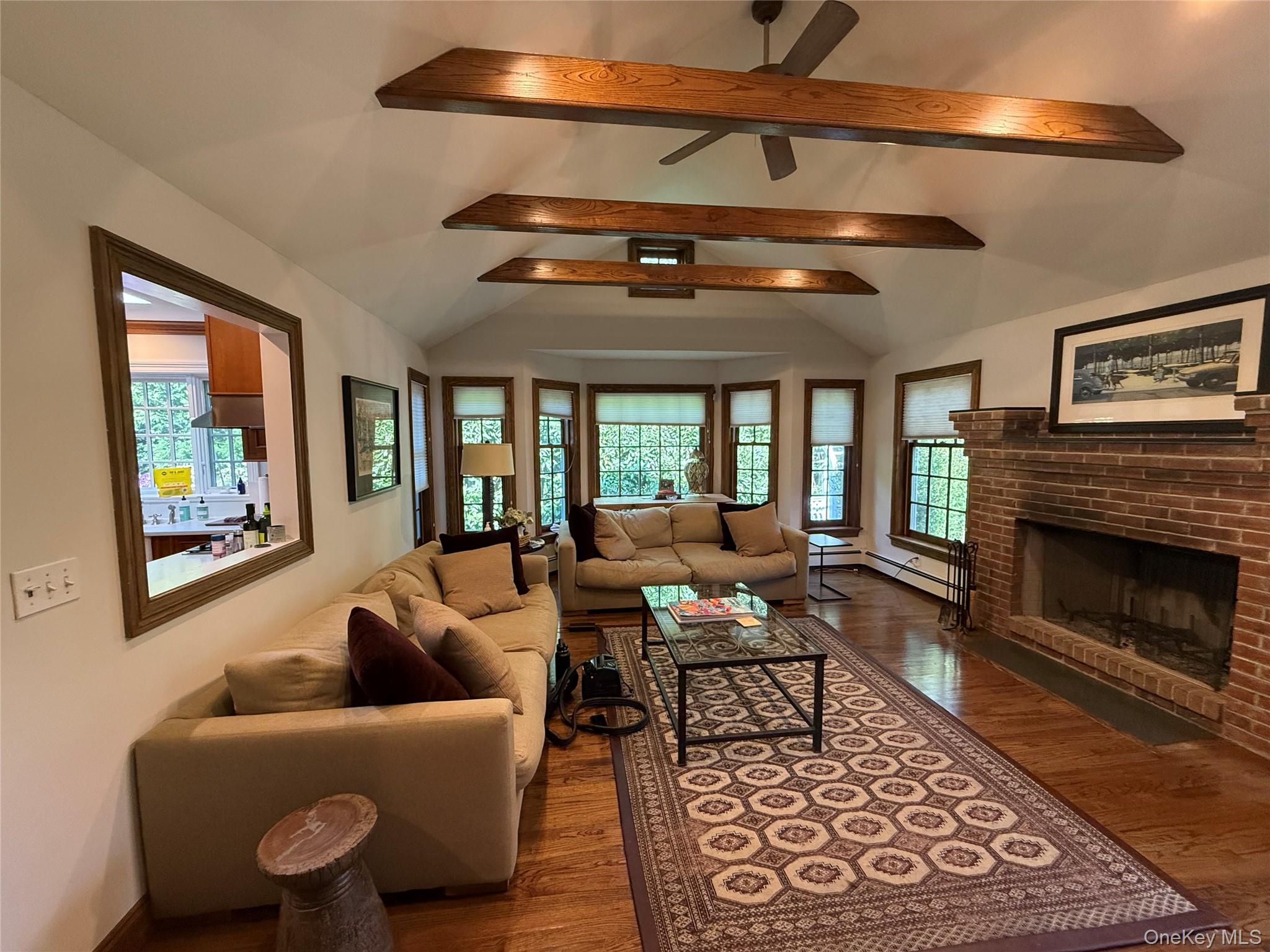 21 Westbank Road Rye, NY 10580 - Photo 13 of 32 a living room with furniture and a fireplace