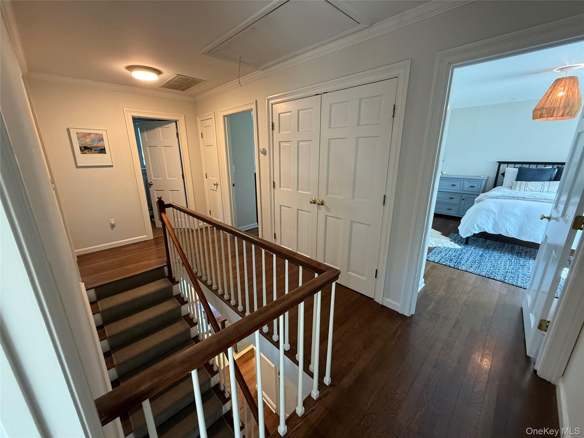 21 Westbank Road Rye, NY 10580 - Photo 14 of 32 a view of a hallway with wooden floor and stairs