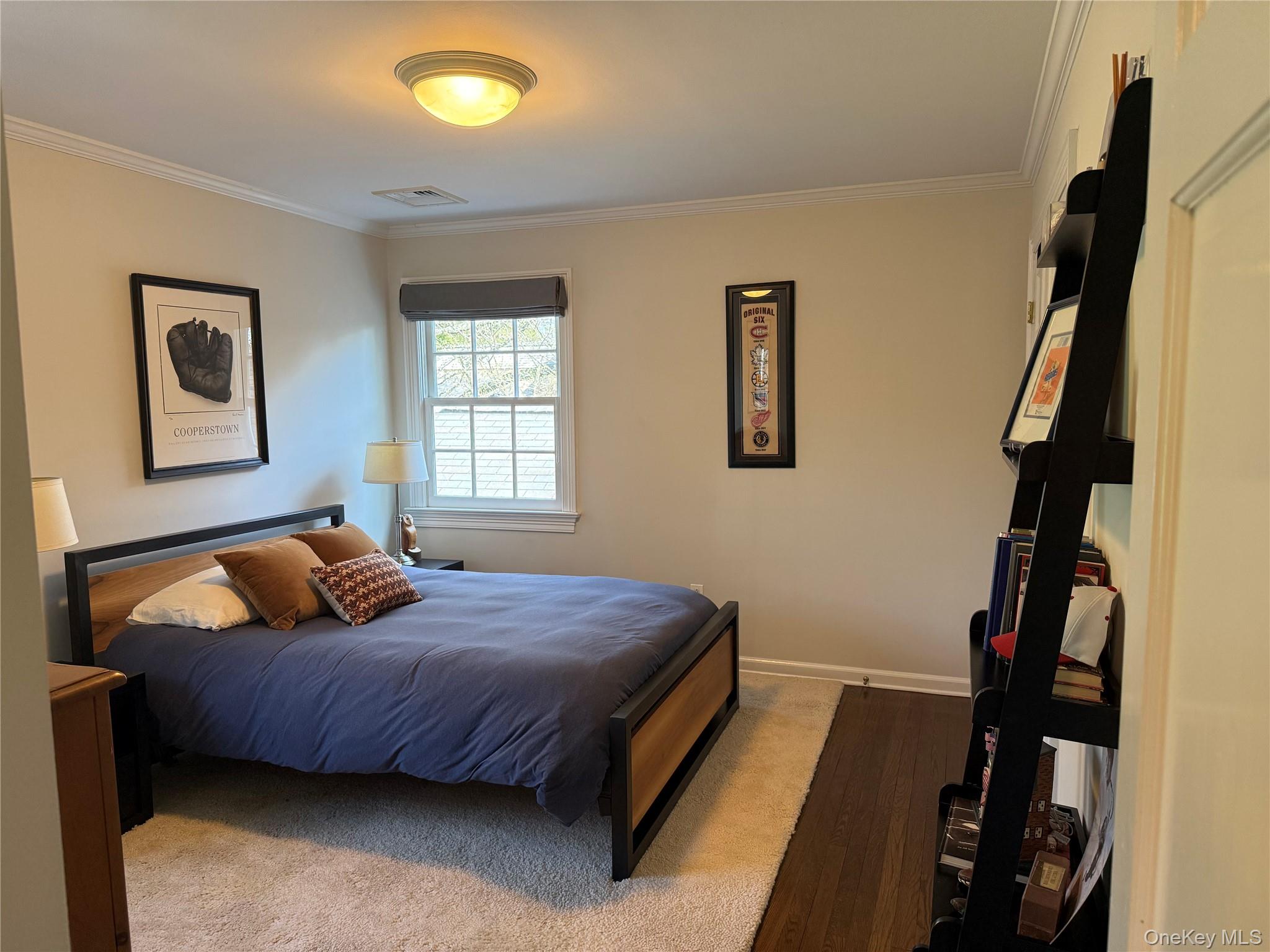 21 Westbank Road Rye, NY 10580 - Photo 18 of 32 a bedroom with a bed and a window