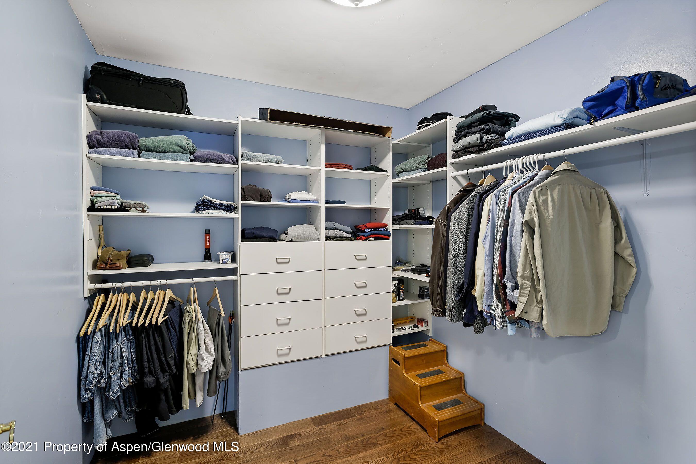 461 Original Road Basalt, CO 81621 - Photo 12 of 23 a view of walk in closet with clothes and shoes