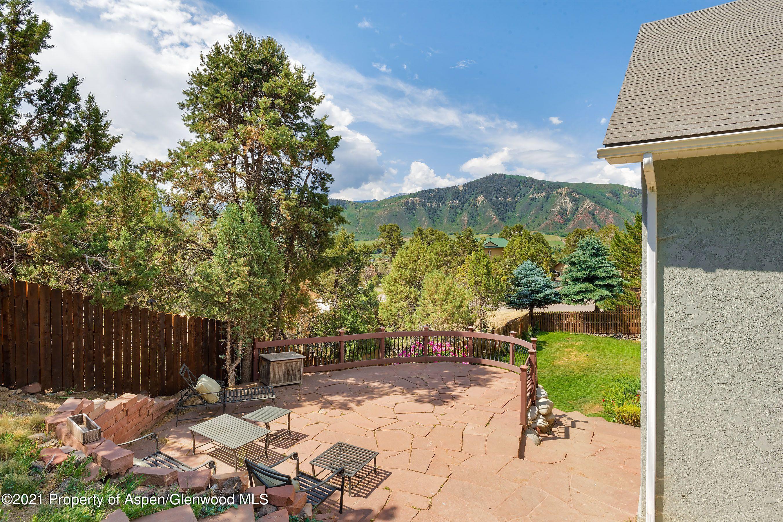 461 Original Road Basalt, CO 81621 - Photo 18 of 23 a view of backyard with swimming pool and seating space