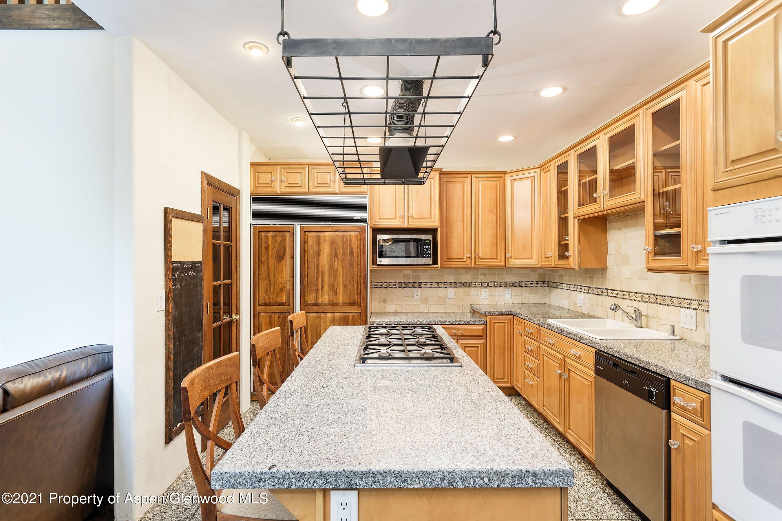 461 Original Road Basalt, CO 81621 - Photo 22 of 23 a view of a kitchen with stainless steel appliances granite countertop a sink and cabinets