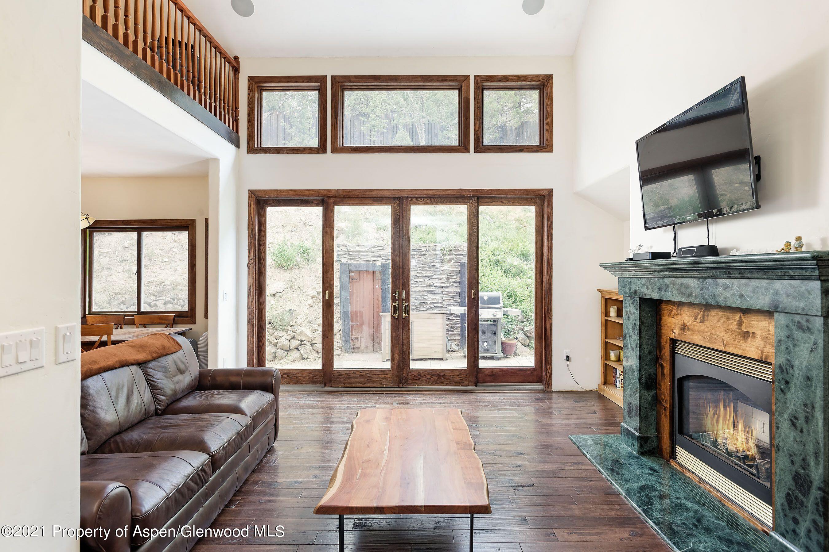 461 Original Road Basalt, CO 81621 - Photo 4 of 23 a living room with furniture and a flat screen tv