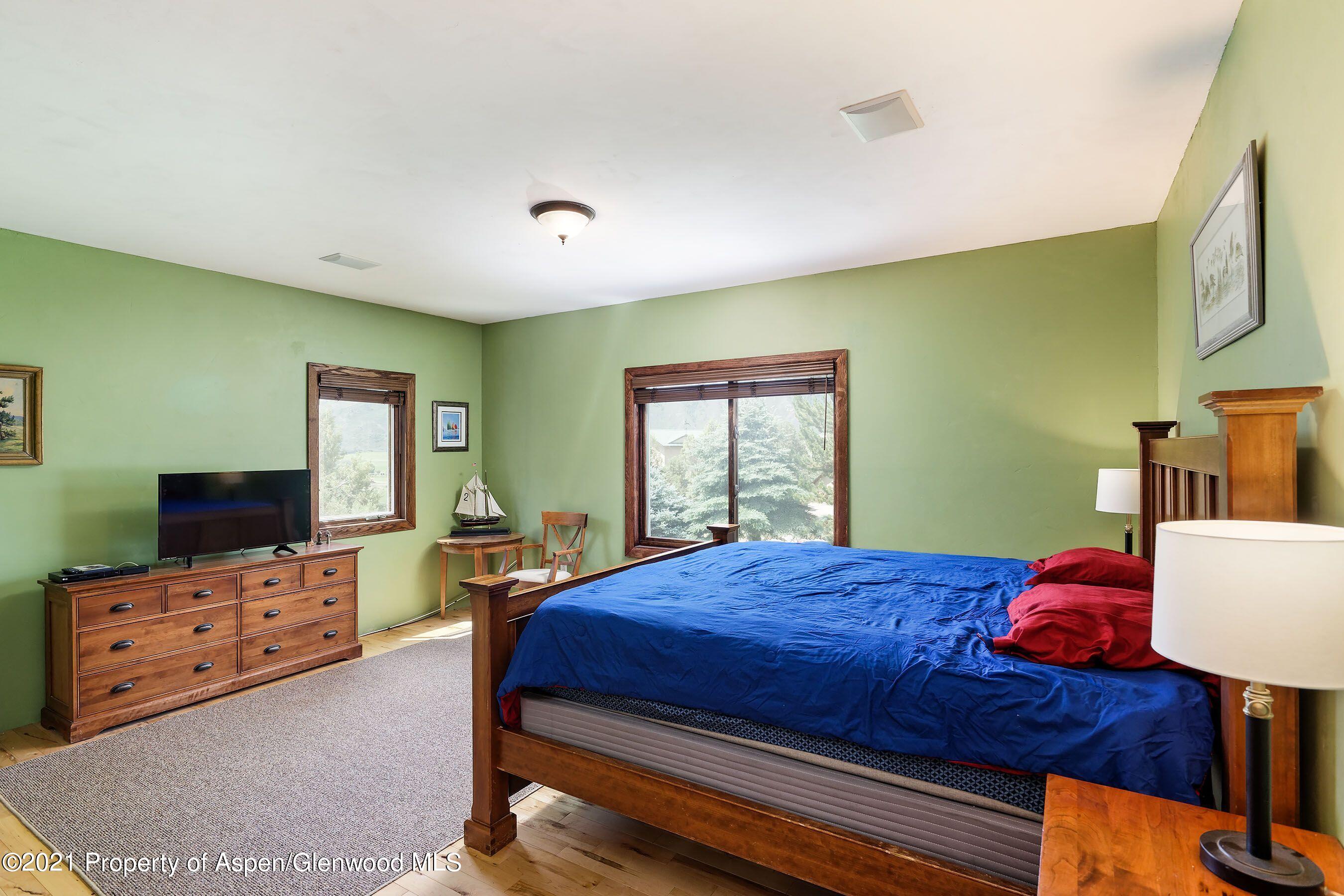 461 Original Road Basalt, CO 81621 - Photo 10 of 23 a bedroom with a bed and furniture