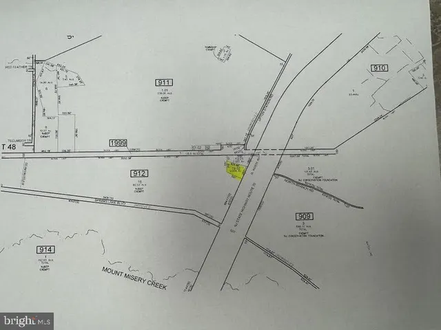 a bathroom with a shower and vanity