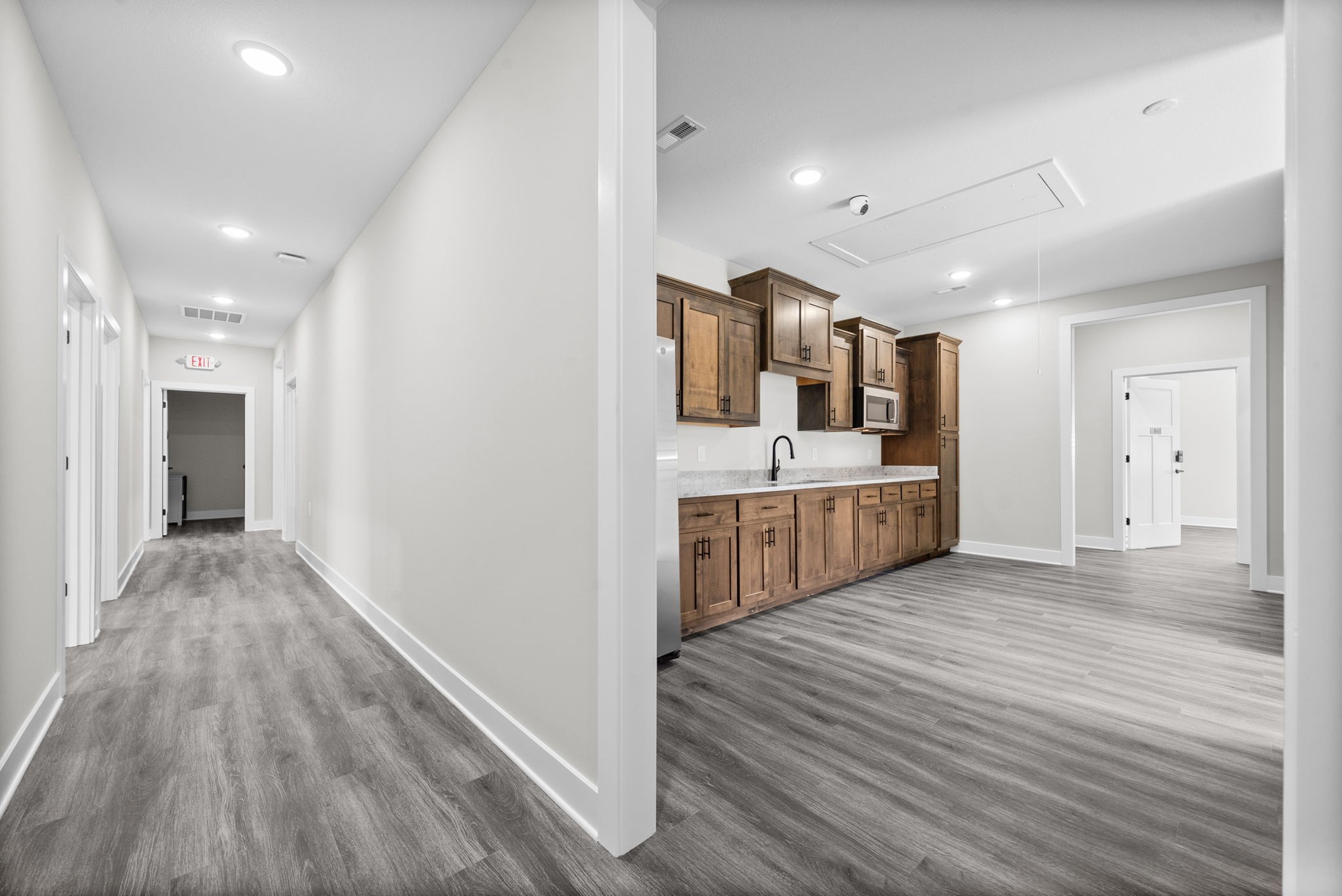2510 Pea Ridge Road Clarksville, TN 37040 - Photo 27 of 40 a view of a kitchen with a sink and wooden floor