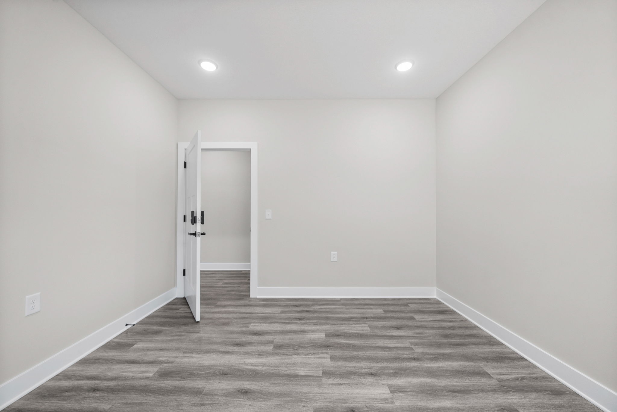 2510 Pea Ridge Road Clarksville, TN 37040 - Photo 31 of 40 a view of an empty room with wooden floor