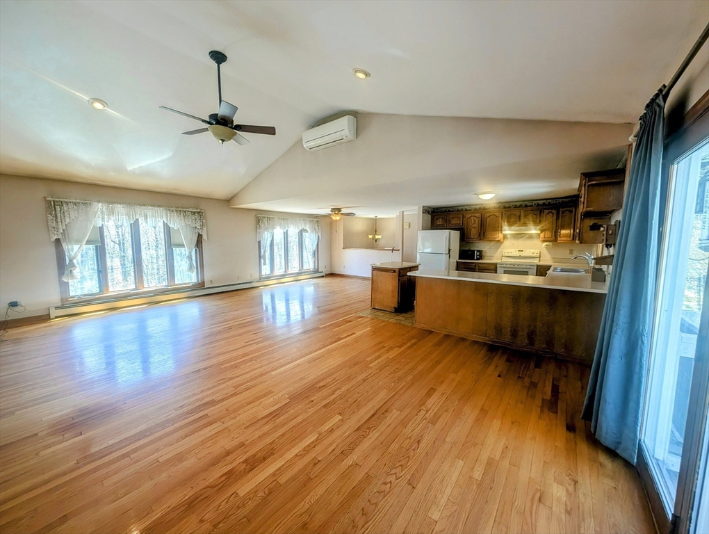 4 Hammerock Road Charlton, MA 01507 - Photo 15 of 39 a view of a kitchen with a sink and wooden floor