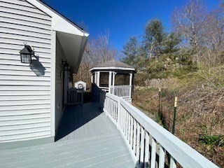 4 Hammerock Road Charlton, MA 01507 - Photo 17 of 39 a view of a balcony and yard