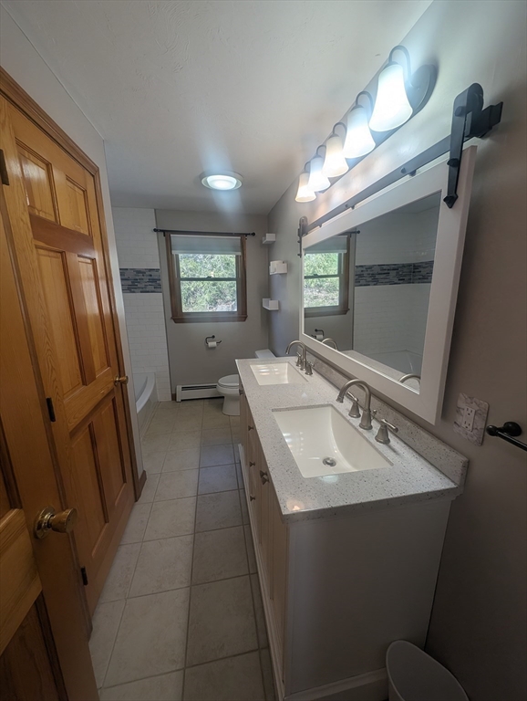 4 Hammerock Road Charlton, MA 01507 - Photo 23 of 39 a bathroom with 2 sink and a mirror