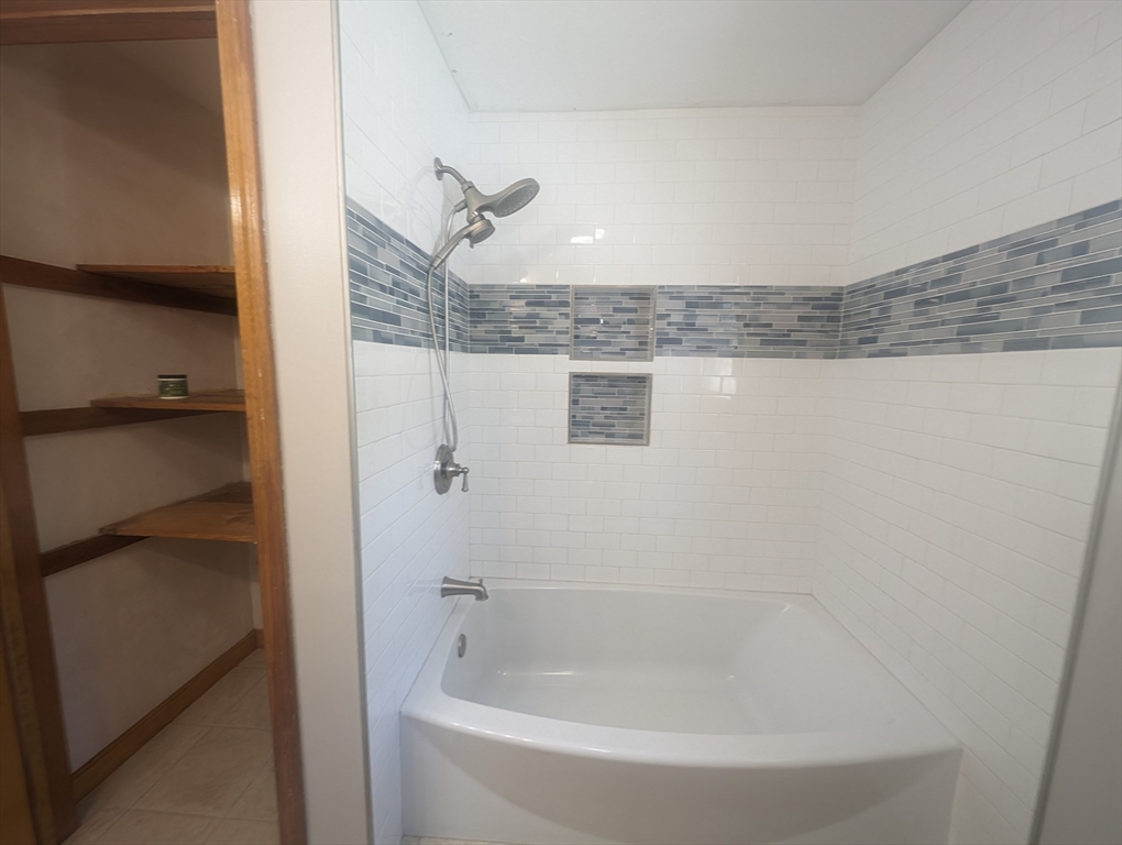 4 Hammerock Road Charlton, MA 01507 - Photo 24 of 39 a bathroom with a bathtub and shower